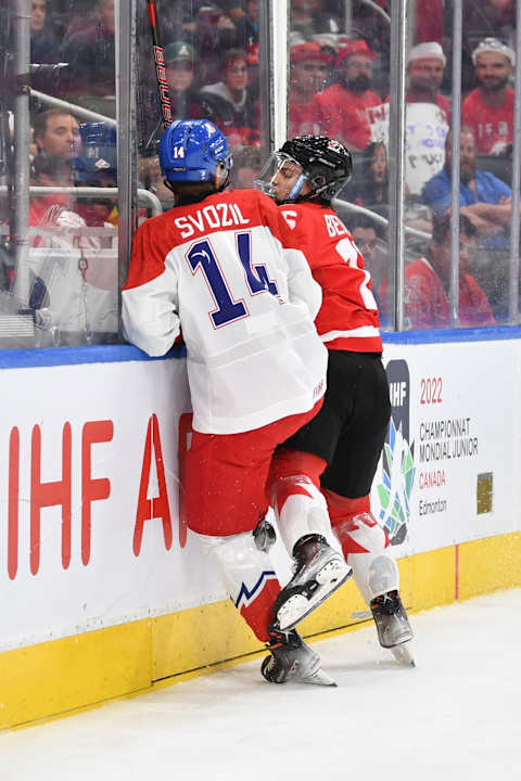 EDMONTON, AB – AUGUST 19: Connor Bedard #16 of Canada collides with Stanislav Svozil #14 of Czechia in the IIHF World Junior Championship on August 19, 2022 at Rogers Place in Edmonton, Alberta, Canada (Photo by Andy Devlin/ Getty Images)