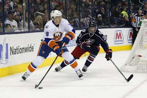 Feb 9, 2016; Columbus, OH, USA; New York Islanders center Ryan Strome (18) looks to pass as Columbus Blue Jackets defenseman Cody Goloubef (29) trails the play during the first period at Nationwide Arena. Mandatory Credit: Russell LaBounty-USA TODAY Sports