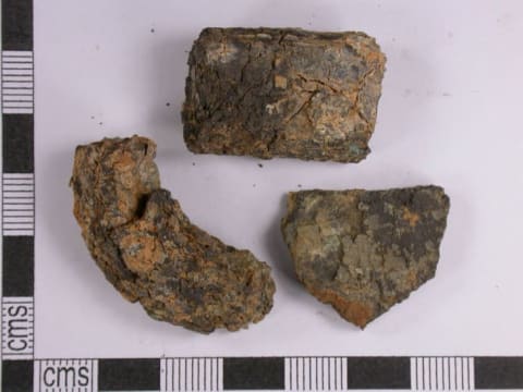 The coins had been buried in a tin container with a handle.