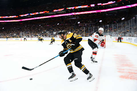 BOSTON, MA – OCTOBER 12: David Krejci #46 of the Boston Bruins handles the puck against the New Jersey Devils in the first period at TD Garden on October 12, 2019 in Boston, Massachusetts. (Photo by Kathryn Riley/Getty Images)