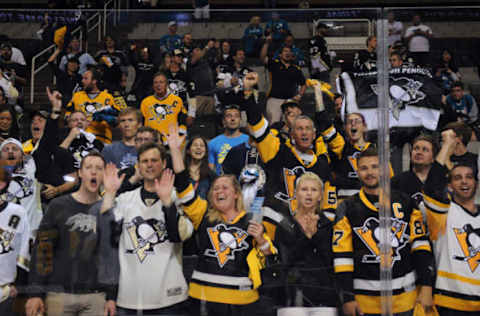 Jun 12, 2016; San Jose, CA, USA; Pittsburgh Penguins fans celebrate in the stands after defeating the San Jose Sharks in game six of the 2016 Stanley Cup Final at SAP Center at San Jose. Mandatory Credit: Gary A. Vasquez-USA TODAY Sports