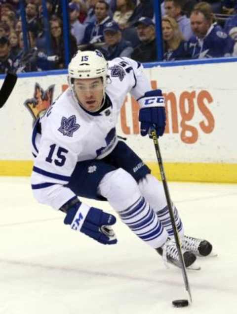 Jan 27, 2016; Tampa, FL, USA; Toronto Maple Leafs right wing P.A. Parenteau (15) skates with the puck against the Tampa Bay Lightning during the first period at Amalie Arena. Mandatory Credit: Kim Klement-USA TODAY Sports