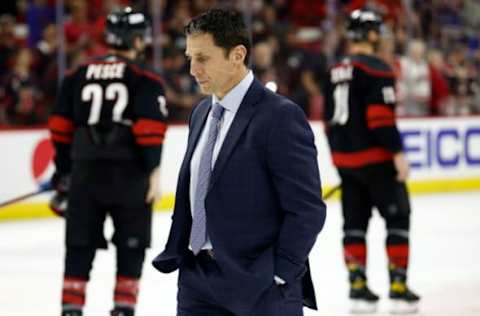 RALEIGH, NORTH CAROLINA – MAY 30: Head coach Rod Brind’Amour of the Carolina Hurricanes walks the ice following their 6-2 defeat in Game Seven of the Second Round of the 2022 Stanley Cup Playoffs against the New York Rangers at PNC Arena on May 30, 2022, in Raleigh, North Carolina. (Photo by Jared C. Tilton/Getty Images)