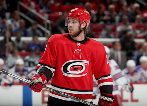 RALEIGH, NC – MARCH 31: Elias Lindholm #28 of the Carolina Hurricanes prepares for a face off during an NHL game against the New York Rangers on March 31, 2018 at PNC Arena in Raleigh, North Carolina. (Photo by Gregg Forwerck/NHLI via Getty Images)