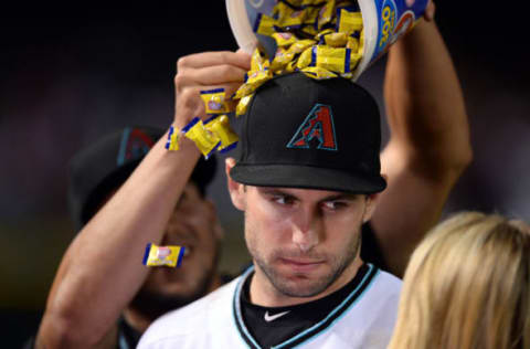 May 17, 2016; Phoenix, AZ, USA; Bubble gum and gatorade is poured over the head of Arizona Diamondbacks first baseman Paul Goldschmidt (44) during a post game interview after facing the New York Yankees at Chase Field. The Diamondbacks won 5-3. Mandatory Credit: Joe Camporeale-USA TODAY Sports