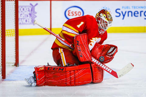 Nov 12, 2016; Calgary, Alberta, CAN; Calgary Flames goalie Brian Elliott (1) makes a save against the New York Rangers during the third period at Scotiabank Saddledome. New York Rangers won 4-1. Mandatory Credit: Sergei Belski-USA TODAY Sports