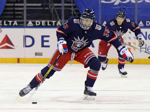 NEW YORK, NEW YORK – FEBRUARY 04: Phillip Di Giuseppe #33 of the New York Rangers skates against the Washington Capitals at Madison Square Garden on February 04, 2021 in New York City. (Photo by Bruce Bennett/Getty Images)