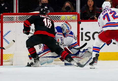 New York Rangers goaltender Alexandar Georgiev (40) stops the breakaway shot by Carolina Hurricanes center Vincent Trocheck (Credit: James Guillory-USA TODAY Sports