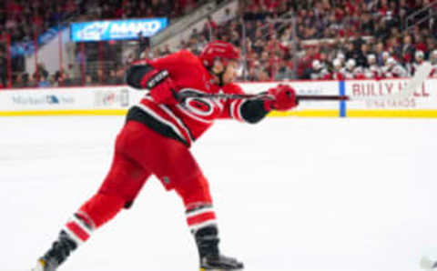 Feb 18, 2018; Raleigh, NC, USA; Carolina Hurricanes forward Jeff Skinner (53) takes a shot against the New Jersey Devils at PNC Arena. The New Jersey Devils defeated the Carolina Hurricanes 3-2 in the overtime. Mandatory Credit: James Guillory-USA TODAY Sports