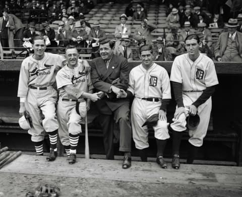 (Original Caption) The St. Louis Cardinals, behind the sterling pitching of Dizzy Dean, defeated the Detroit Tigers, 8-3, in the first game of the World Series at Navin Field, Detroit, October 3rd. Pictured before the game are (left to right) Dizzy Dean; Frank Frisch, manager of the Cards; Babe Ruth, home run king; Mickey Cochrane, manager of the Tigers; and Schoolboy Rowe, star pitcher of the Tigers.