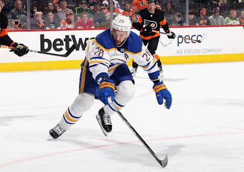 PHILADELPHIA, PENNSYLVANIA – MARCH 17: Zemgus Girgensons #28 of the Buffalo Sabres skates against the Philadelphia Flyers at the Wells Fargo Center on March 17, 2023 in Philadelphia, Pennsylvania. (Photo by Bruce Bennett/Getty Images)