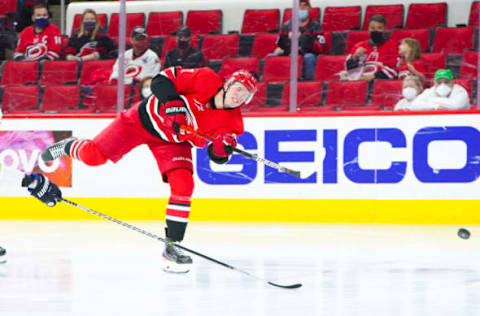 Apr 6, 2021; Raleigh, North Carolina, USA; Carolina Hurricanes right wing Andrei Svechnikov (37) takes a shot against the Florida Panthers at PNC Arena. Mandatory Credit: James Guillory-USA TODAY Sports