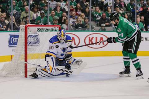 DALLAS, TX – MARCH 03: St. Louis Blues goaltender Carter Hutton (40) blocks a shot from Dallas Stars left wing Jamie Benn (14) during the game between the Dallas Stars and the St. Louis Blues on March 3, 2018 at the American Airlines Center in Dallas, Texas. Dallas defeats St. Louis 3-2 in overtime. (Photo by Matthew Pearce/Icon Sportswire via Getty Images)