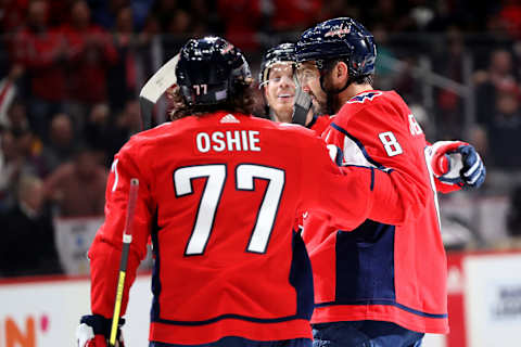 WASHINGTON, DC – NOVEMBER 18: Alex Ovechkin #8 of the Washington Capitals celebrate a second period goal against the Anaheim Ducks with teammate T.J. Oshie #77 at Capital One Arena on November 18, 2019 in Washington, DC. (Photo by Rob Carr/Getty Images)