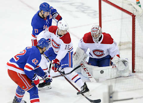 NEW YORK, NY – MARCH 01: New York Rangers Defenceman Brendan Smith (42) takes a shot off the goalpost during the first period of the National Hockey League game between the Montreal Canadiens and the New York Rangers on March 1, 2019 at Madison Square Garden in New York, NY. (Photo by Joshua Sarner/Icon Sportswire via Getty Images)