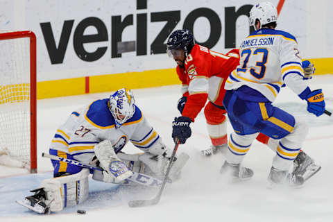 Apr 4, 2023; Sunrise, Florida, USA; Buffalo Sabres goaltender Devon Levi (27) makes a save after a shot from Florida Panthers left wing Anthony Duclair (10) during the third period at FLA Live Arena. Mandatory Credit: Sam Navarro-USA TODAY Sports