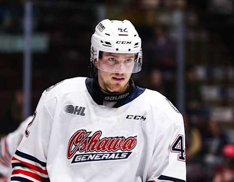 OSHAWA, ONTARIO – SEPTEMBER 30: Cameron Butler #42 of the Oshawa Generals looks on during the first period against the Ottawa 67’s at Tribute Communities Centre on September 30, 2022 in Oshawa, Ontario. (Photo by Chris Tanouye/Getty Images)