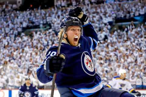 WINNIPEG, MB – APRIL 10: Patrik Laine #29 of the Winnipeg Jets celebrates after scoring a first period goal against the St. Louis Blues in Game One of the Western Conference First Round during the 2019 NHL Stanley Cup Playoffs at the Bell MTS Place on April 10, 2019 in Winnipeg, Manitoba, Canada. (Photo by Darcy Finley/NHLI via Getty Images)