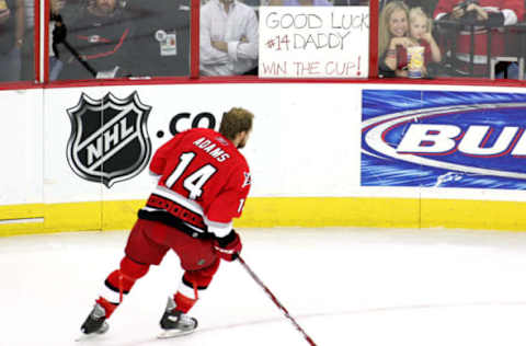 Kevyn Adams gets a pregame message from his wife and daughter (upper left), pregame. The Carolina Hurricanes defeated the Edmonton Oilers 3-1 at the RBC Center in Raleigh, North Carolina in game seven of the Stanley Cup Final to win the Stanley Cup. (Photo by Scott Bales/Icon SMI/Icon Sport Media via Getty Images)