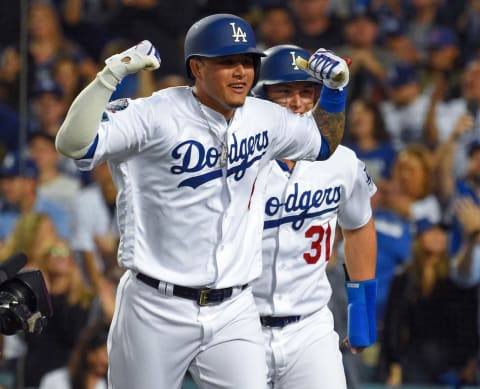 LOS ANGELES, CA – OCTOBER 05: Manny Machado #8 of the Los Angeles Dodgers and Joc Pederson celebrate Machado”u201aÄôs 2nd inning 2-run homer in game two of the NLDS at Dodger Stadium on Friday, October 5, 2018 in in Los Angeles, California. (Photo by Scott Varley/Digital First Media/Torrance Daily Breeze via Getty Images)