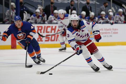 New York Rangers center Mika Zibanejad (93) controls the puck against New York Islanders Credit: Brad Penner-USA TODAY Sports