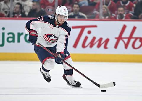 MONTREAL, CANADA – OCTOBER 26: Johnny Gaudreau #13 of the Columbus Blue Jackets skates the puck during the third period against the Montreal Canadiens at the Bell Centre on October 26, 2023 in Montreal, Quebec, Canada. The Montreal Canadiens defeated the Columbus Blue Jackets 4-3 in overtime. (Photo by Minas Panagiotakis/Getty Images)