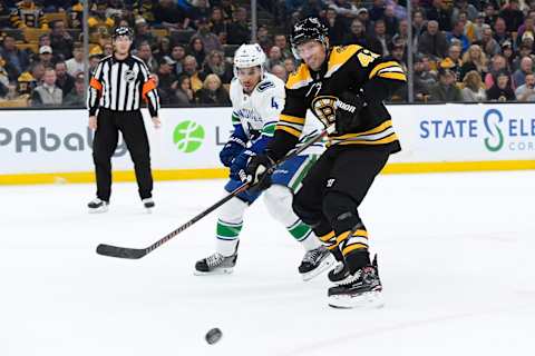 BOSTON, MA – NOVEMBER 8: David Backes #42 of the Boston Bruins fights for the puck against the Vancouver Canucks at the TD Garden on November 8, 2018 in Boston, Massachusetts. (Photo by Brian Babineau/NHLI via Getty Images)