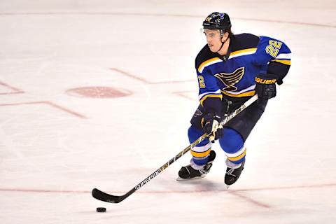 Dec 31, 2015; St. Louis, MO, USA; St. Louis Blues defenseman Kevin Shattenkirk (22) skates with the puck in the game against the Minnesota Wild during the third period at Scottrade Center. The Minnesota Wild defeat the St. Louis Blues 3-1. Mandatory Credit: Jasen Vinlove-USA TODAY Sports