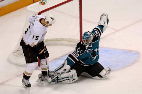 Ryan Getzlaf #15, Anaheim Ducks, Evgeni Nabokov #20, San Jose Sharks (Photo by Stephen Dunn/Getty Images)