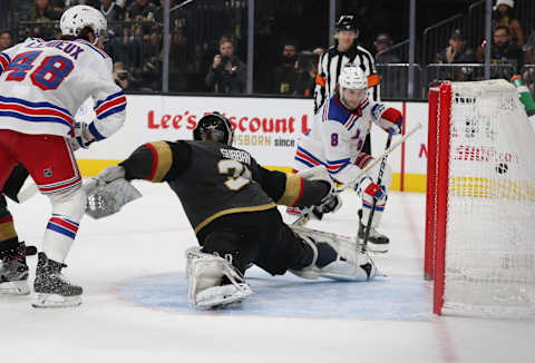 Jacob Trouba #8 of the New York Rangers scores