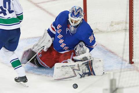 NEW YORK, NY – NOVEMBER 12: New York Rangers goaltender Henrik Lundqvist (30) tracks loose puck during the Vancouver Canucks and New York Rangers NHL game on November 12, 2018, at Madison Square Garden in New York, NY. (Photo by John Crouch/Icon Sportswire via Getty Images)