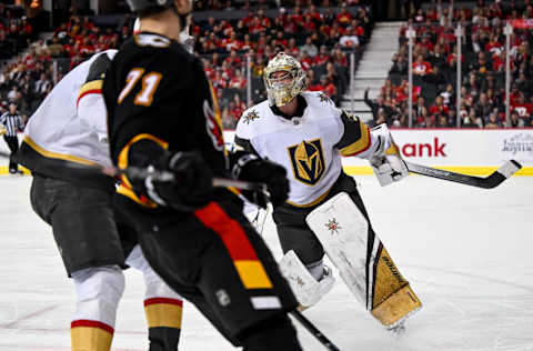 Mar 23, 2023; Calgary, Alberta, CAN; Vegas Golden Knights goaltender Logan Thompson (36) reacts after a shot by Calgary Flames right wing Walker Duehr (71) after he gets caught out of his net during the third period at Scotiabank Saddledome. Mandatory Credit: Brett Holmes-USA TODAY Sports