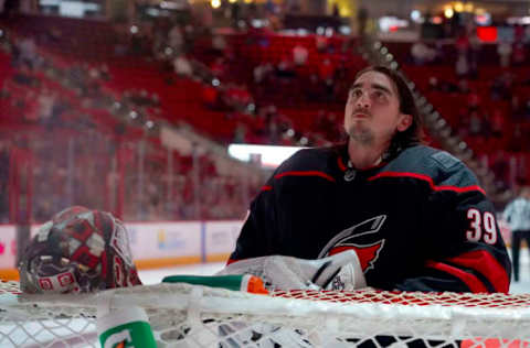 Mar 18, 2021; Raleigh, North Carolina, USA; Carolina Hurricanes goaltender Alex Nedeljkovic (39) looks on before the game against the Columbus Blue Jackets at PNC Arena. Mandatory Credit: James Guillory-USA TODAY Sports