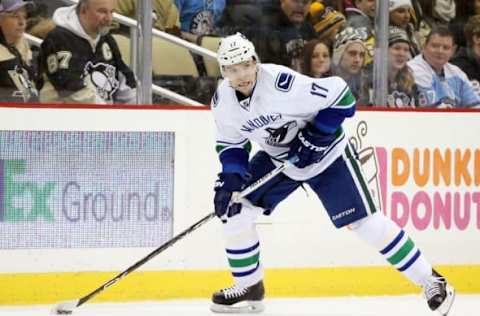 Jan 23, 2016; Pittsburgh, PA, USA; Vancouver Canucks right wing Radim Vrbata (17) skates with the puck against the Pittsburgh Penguins during the third period at the CONSOL Energy Center. The Penguins won 5-4. Mandatory Credit: Charles LeClaire-USA TODAY Sports