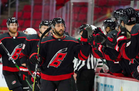 Jan 30, 2021; Raleigh, North Carolina, USA; Carolina Hurricanes center Vincent Trocheck (16) celebrates his first period goal against the Dallas Stars at PNC Arena. Mandatory Credit: James Guillory-USA TODAY Sports