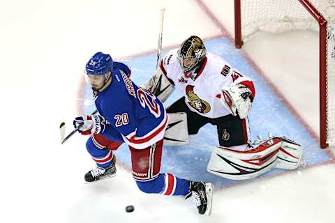 May 4, 2017; New York, NY, USA; New York Rangers left wing Chris Kreider (20) plays the puck in front of Ottawa Senators goalie Craig Anderson (41) during the second period of game four of the second round of the 2017 Stanley Cup Playoffs at Madison Square Garden. Mandatory Credit: Brad Penner-USA TODAY Sports