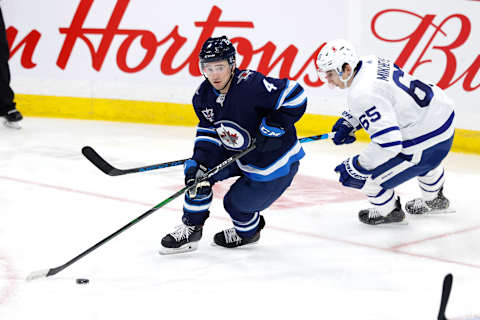 Winnipeg Jets, Neal Pionk (4). Mandatory Credit: James Carey Lauder-USA TODAY Sports