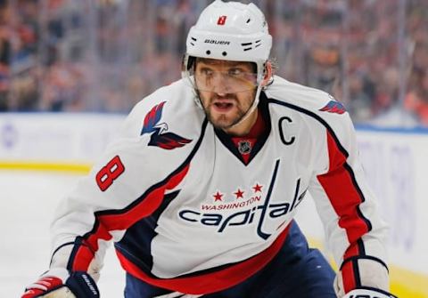 Oct 26, 2016; Edmonton, Alberta, CAN; Washington Capitals forward Alex Ovechkin (8) looks for a loose puck against he Edmonton Oilers at Rogers Place. Mandatory Credit: Perry Nelson-USA TODAY Sports