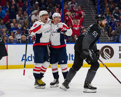 TAMPA, FL – MARCH 30: Alex Ovechkin #8 of the Washington Capitals celebrates his 50th goal of the season with teammate Nicklas Backstrom and against the Tampa Bay Lightning at Amalie Arena on March 30, 2019 in Tampa, Florida. (Photo by Mark LoMoglio/NHLI via Getty Images)