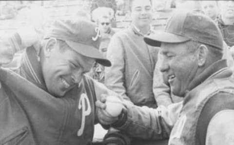 Robin Roberts (left), star of the beleaguered 1961 Philadelphia Phillies, with pitching coach Bob Lemon prior to opening day in 1962. Credit: Denver Post (Denver Post via Getty Images)