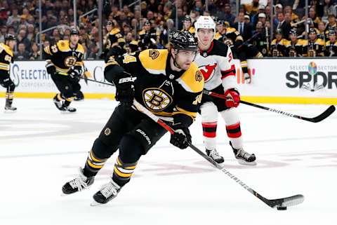 BOSTON, MA – OCTOBER 12: Boston Bruins left wing Jake DeBrusk (74) carries the puck during a game between the Boston Bruins and the New Jersey Devils on October 12, 2019, at TD Garden in Boston, Massachusetts. (Photo by Fred Kfoury III/Icon Sportswire via Getty Images)