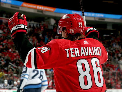 RALEIGH, NC – MARCH 4: Teuvo Teravainen #86 of the Carolina Hurricanes celebrates his first period goal against the Winnipeg Jets during an NHL game on March 4, 2018 at PNC Arena in Raleigh, North Carolina. (Photo by Gregg Forwerck/NHLI via Getty Images)