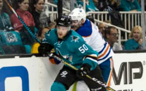 Edmonton Oilers center Mark Letestu (55) checks San Jose Sharks center Chris Tierney (50) in the 2017 Stanley Cup Playoffs (John Hefti-USA TODAY Sports)