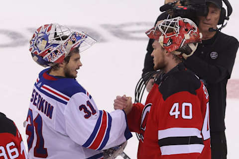 New York Rangers Igor Shesterkin (31) and New Jersey Devils Akira Schmid (40): Ed Mulholland-USA TODAY Sports