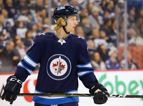 WINNIPEG, MB – NOVEMBER 9: Kyle Connor #81 of the Winnipeg Jets looks on during a second period stoppage in play against the Colorado Avalanche at the Bell MTS Place on November 9, 2018 in Winnipeg, Manitoba, Canada. The Jets defeated the Avs 5-2. (Photo by Darcy Finley/NHLI via Getty Images)