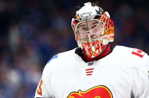 Feb 29, 2020; Tampa, Florida, USA; Calgary Flames goaltender David Rittich (33) looks on against the Tampa Bay Lightning during the third period at Amalie Arena. Mandatory Credit: Kim Klement-USA TODAY Sports