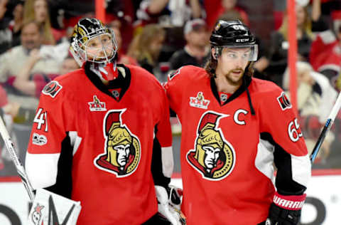 Ottawa Senators defenceman Erik Karlsson (65) congratulates goalie Craig Anderson as they celebrate a 2-1 win (Dan Hamilton-USA TODAY Sports)