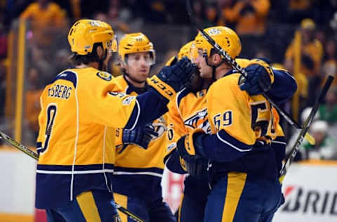 Feb 12, 2017; Nashville, TN, USA; Nashville Predators players celebrate after a goal by defenseman Roman Josi (59) during the third period against the Dallas Stars at Bridgestone Arena. Mandatory Credit: Christopher Hanewinckel-USA TODAY Sports