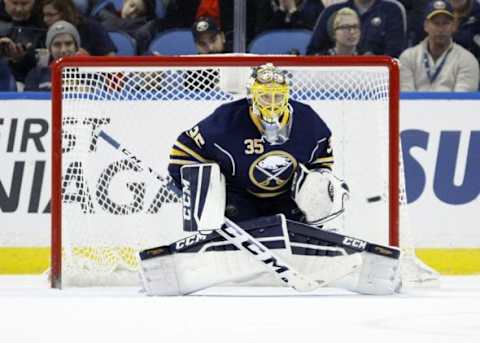 Dec 31, 2015; Buffalo, NY, USA; Buffalo Sabres goalie Linus Ullmark (35) looks to make a save during the second period against the New York Islanders at First Niagara Center. Mandatory Credit: Timothy T. Ludwig-USA TODAY Sports