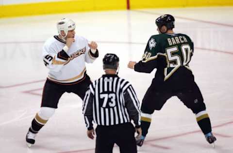 DALLAS: Shawn Thornton #45 of the Anaheim Ducks fights against Krys Barch #50 of the Dallas Stars on February 10, 2007. (Photo by Ronald Martinez/Getty Images)